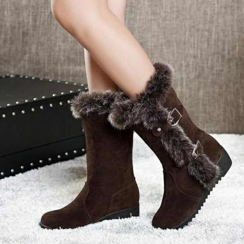 Plush-lined mid-calf snow boots that slip on with ease