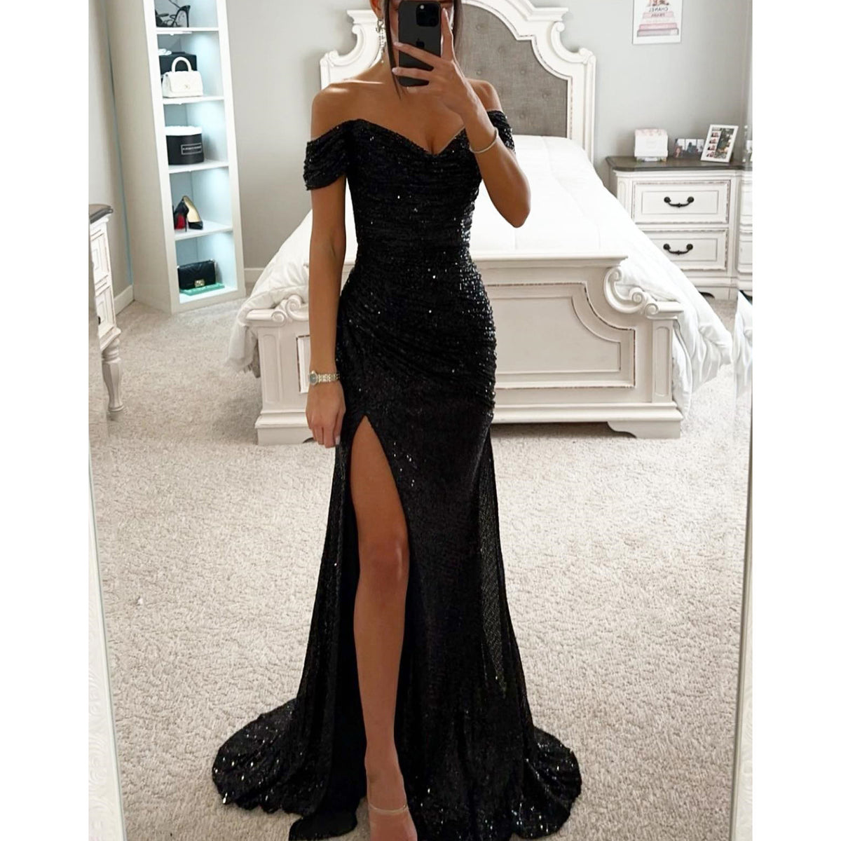 Woman in off-shoulder sequin evening gown
