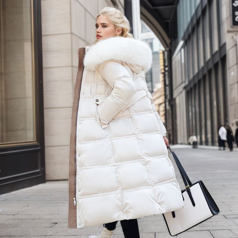 Woman in a long parka with faux fur hood