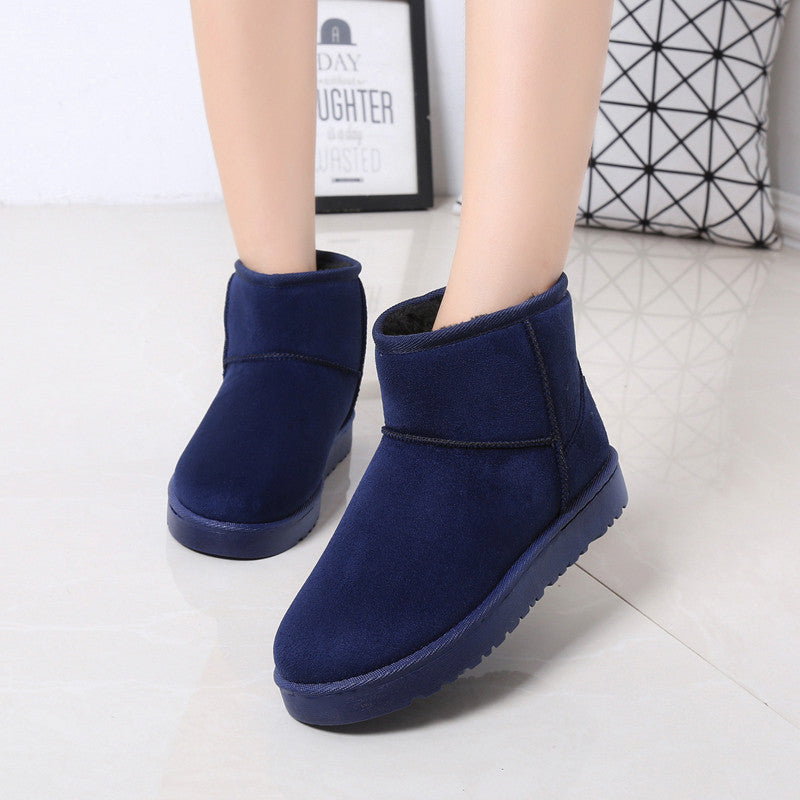 Women's snow boots in suede with faux fur trim and non-slip sole