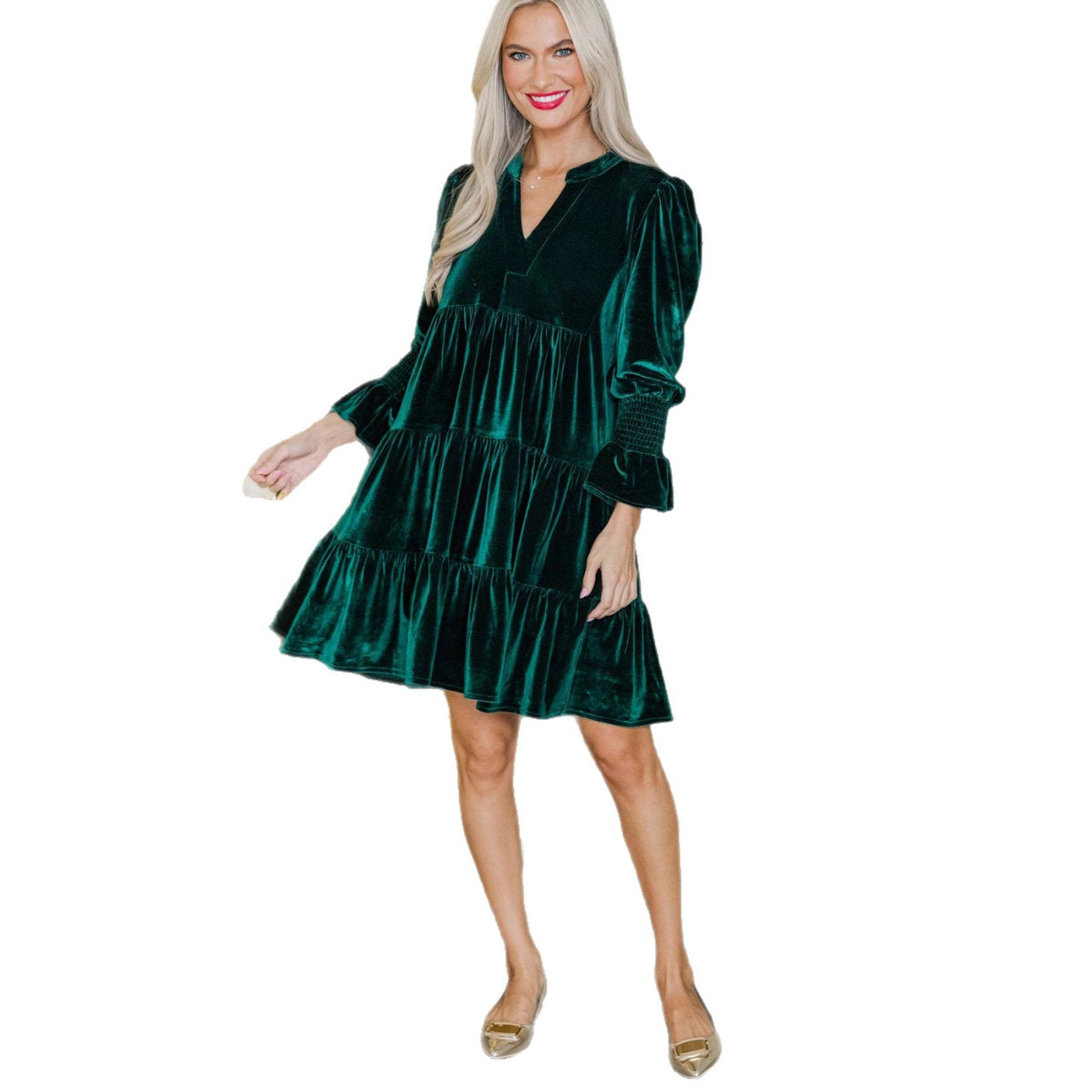 Woman in a velvet tiered mini dress