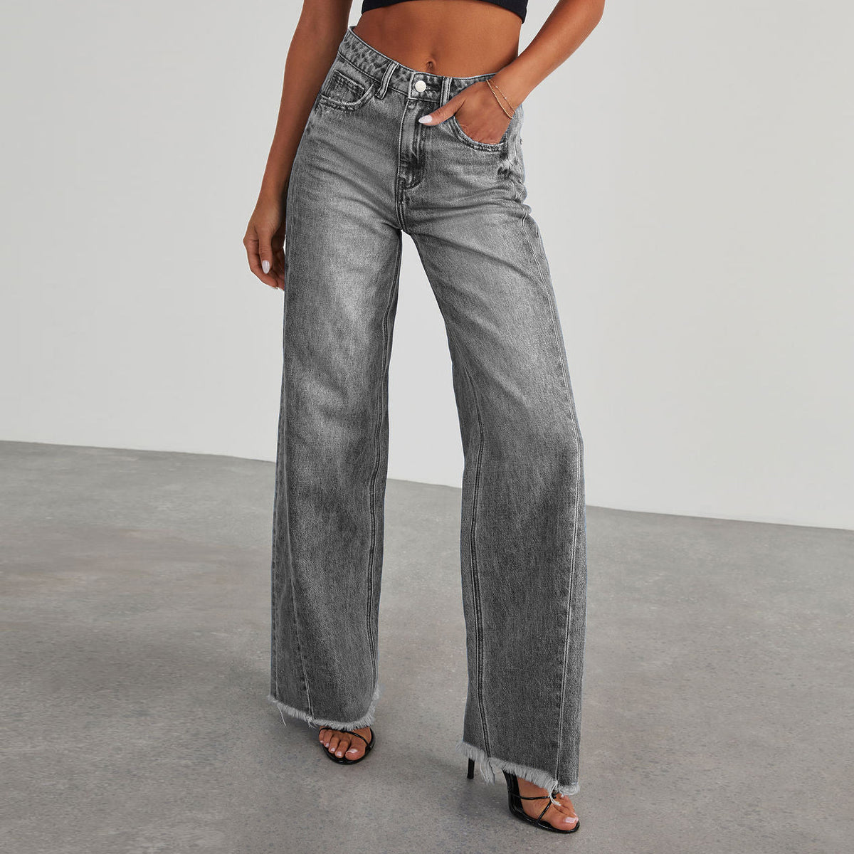 High-waisted straight wide-leg jeans with frayed hem details