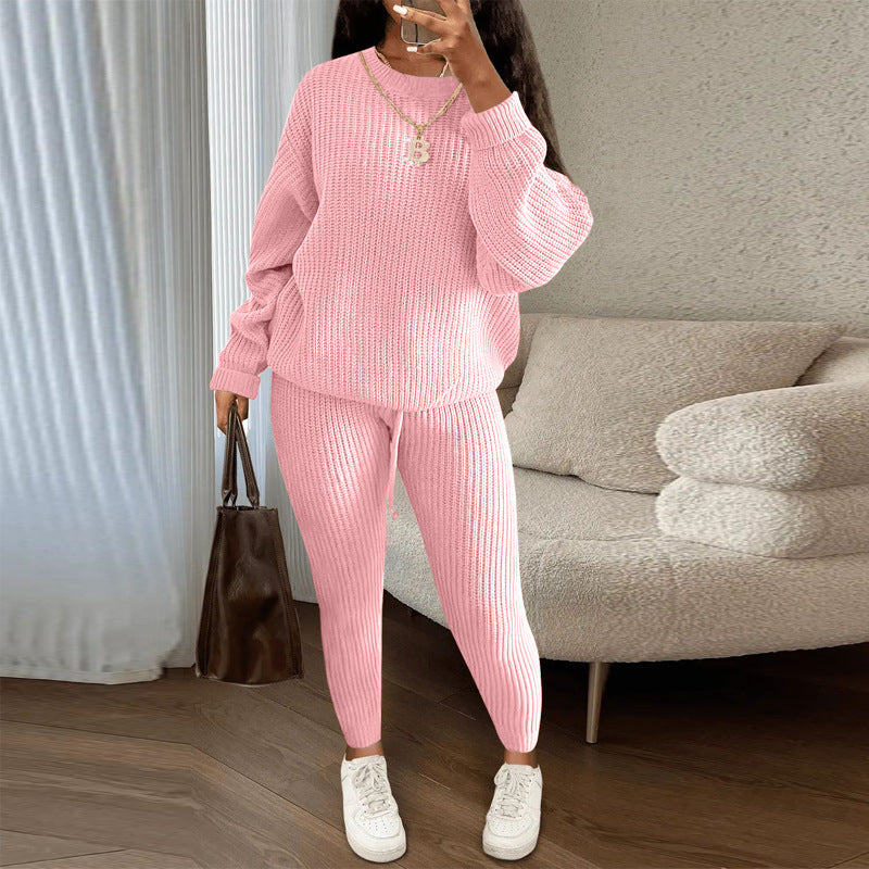 Woman in ribbed knit jumper and trousers set