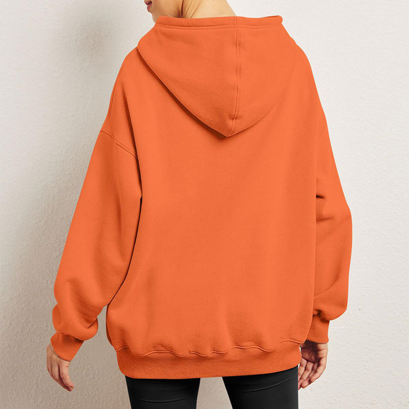 Woman in oversized fleece-lined hoodie