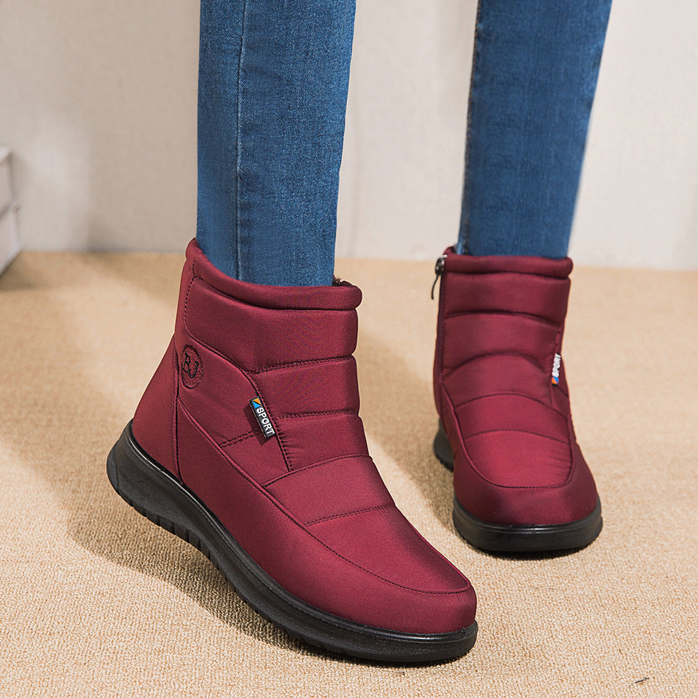 Women's snow boots with a warm lining and non-slip flat sole