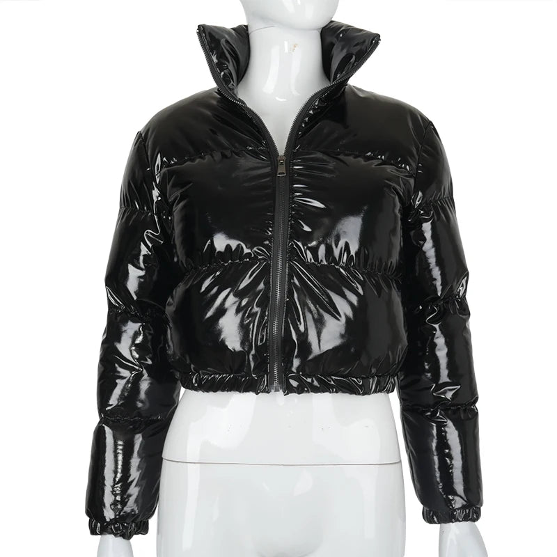 Woman in a glossy cropped puffer jacket