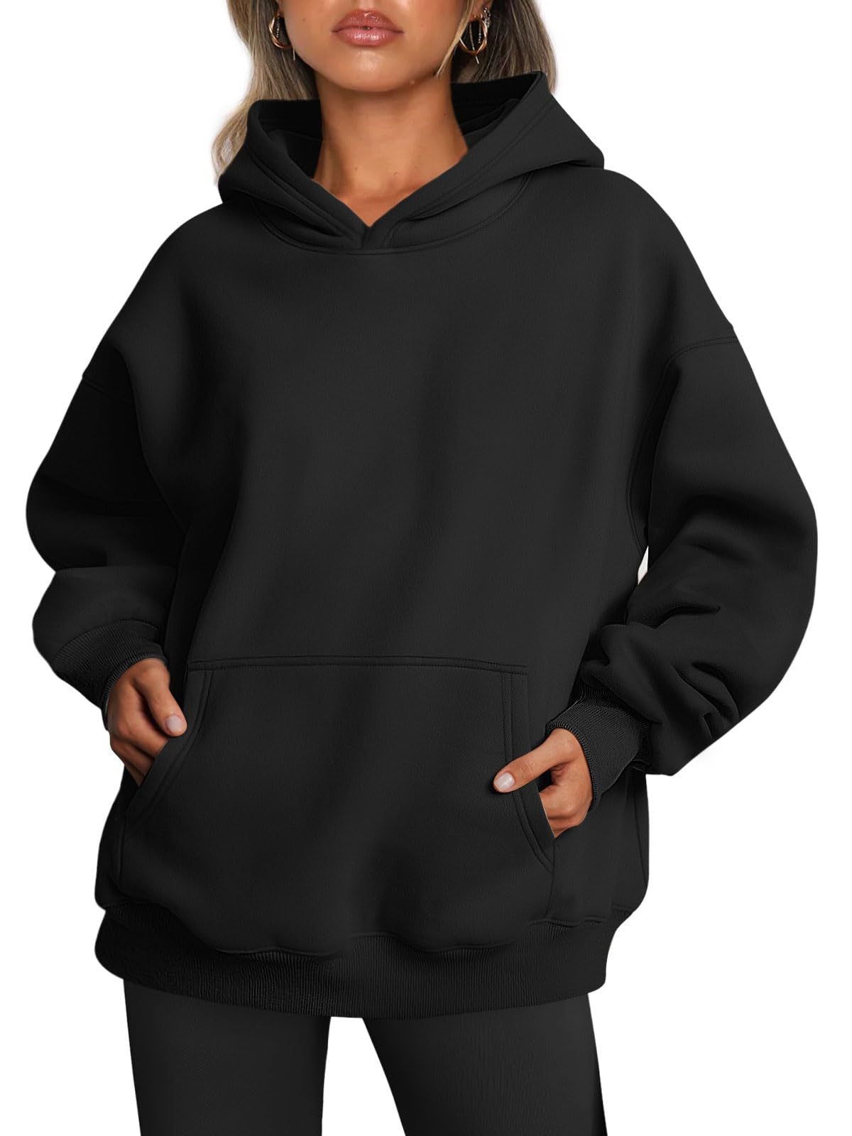 Woman in oversized fleece-lined hoodie