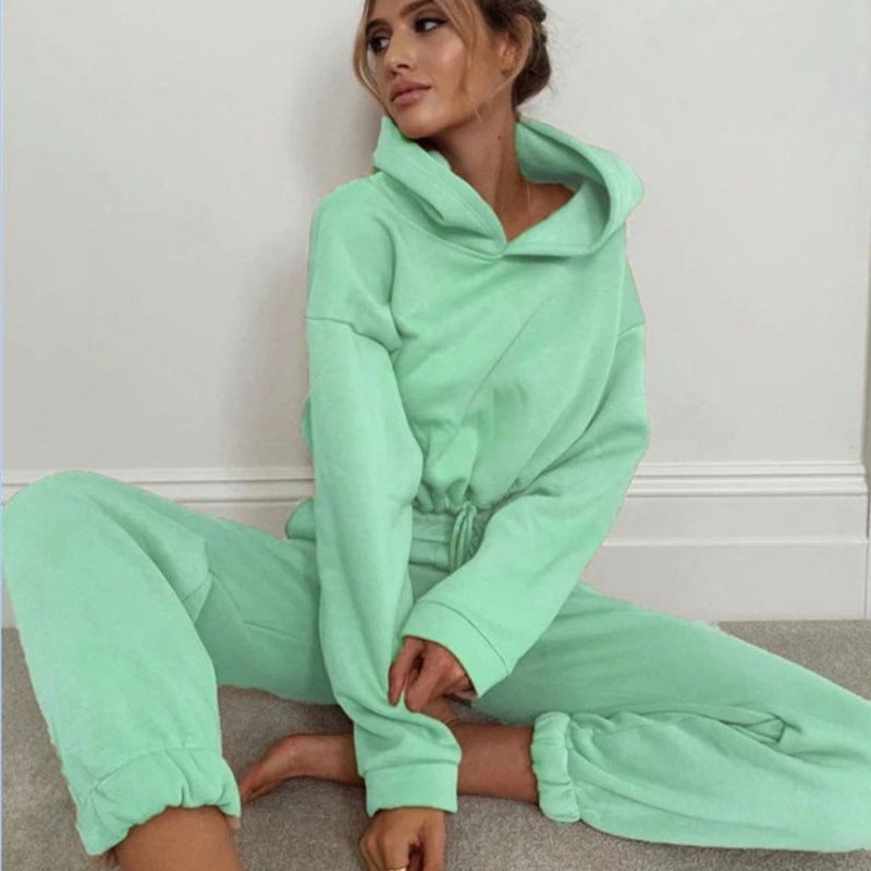 Woman in cropped hoodie and joggers