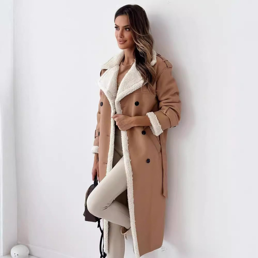 Woman in a long double-breasted belted coat