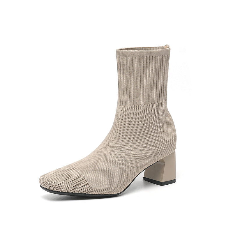 Knitted sock boots with chunky heel and stretchy mid-calf fit