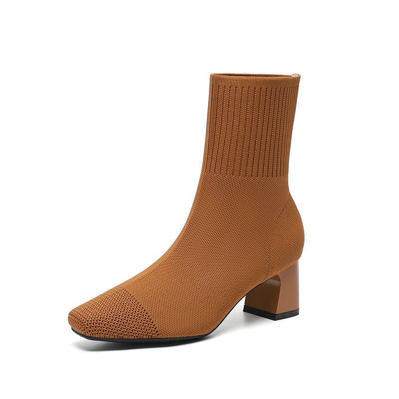 Knitted sock boots with chunky heel and stretchy mid-calf fit